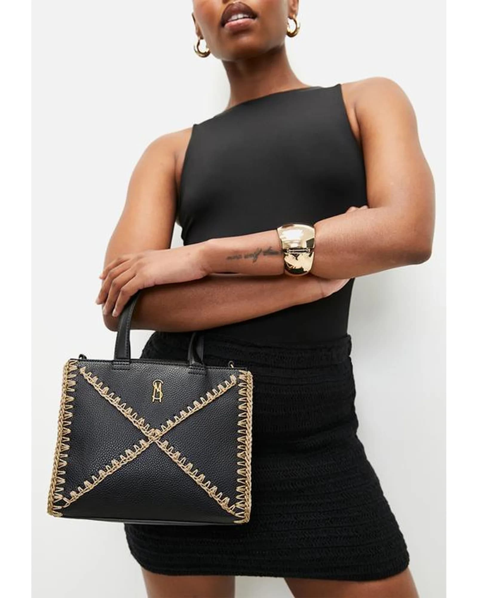 STEVE MADDEN BARIS BLACK/GOLD TOTE